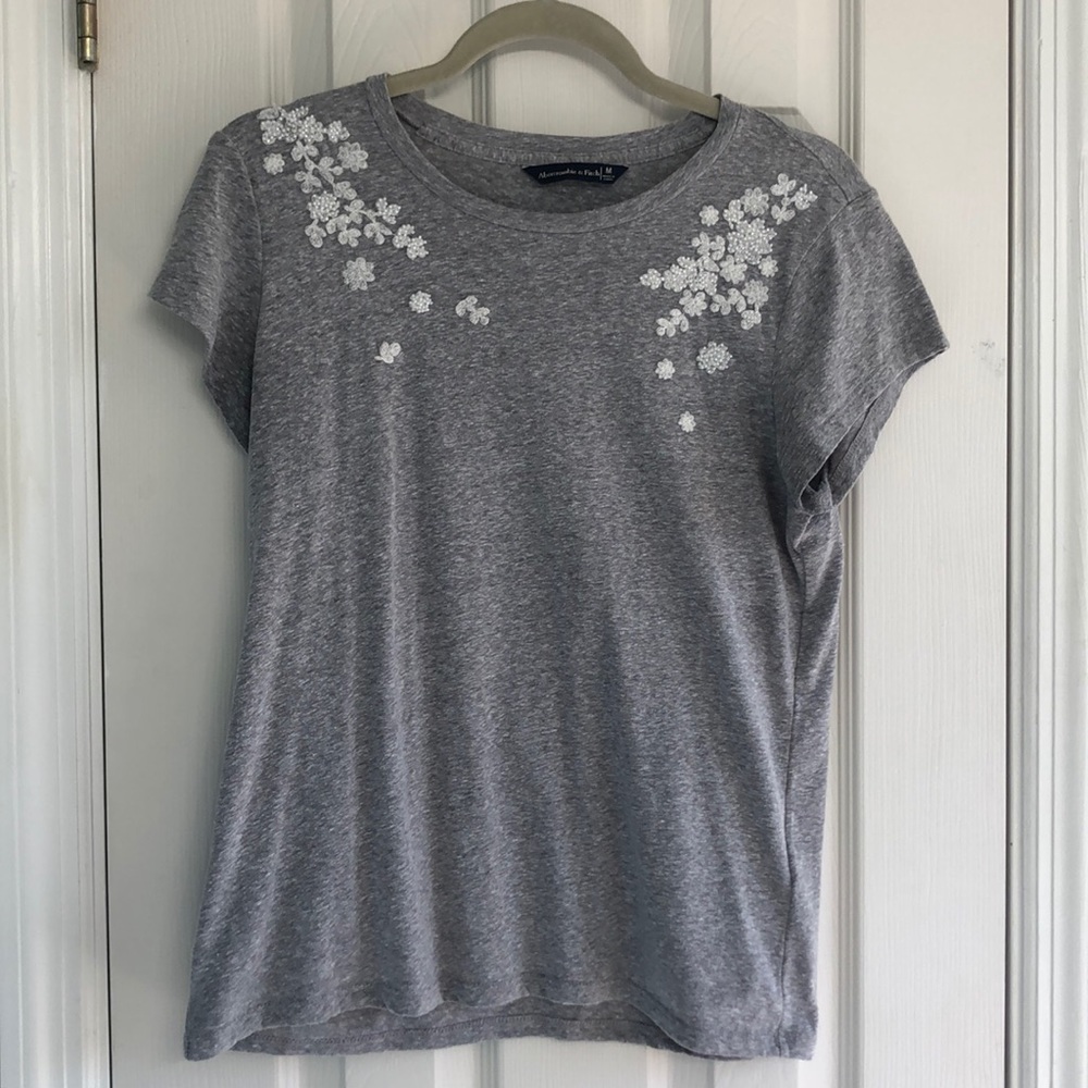Grey t shirt with floral embellishments